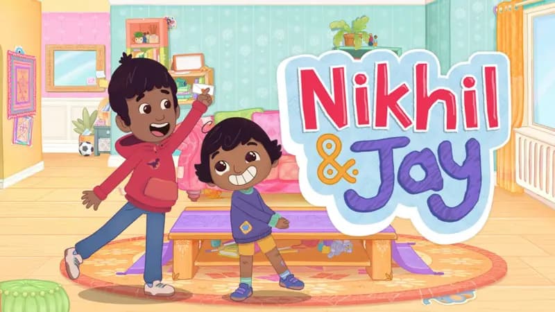 Brothers Nikhil & Jay are in the living room playing.  